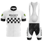 Vintage cycling enthusiasts will love the Peugeot Black White Retro Short Sleeve Cycling Set, featuring a jersey with Peugeot and Michelin text, a black and white checkered pattern, BP logo sleeves, and matching shorts with Peugeot text along the side.
