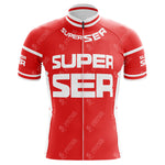 The Super Ser Retro Cycling Jersey is a red polyester jersey featuring bold white SUPER SER text on the front and sleeves. It has a full-length zipper, small white accents on the shoulders and sides, a classic cut, and a high collar reminiscent of retro cycling jerseys.