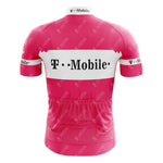 The T-Mobile Retro Short Sleeve Cycling Set is a pink jersey with bold white T-Mobile logos on the back and arms, a horizontal white stripe across the upper back, and smaller logos throughout for a vintage look.