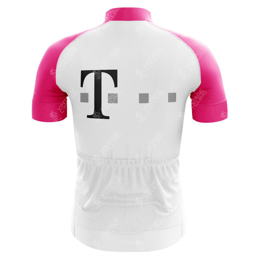 Back view of the T-Mobile Uvex Pink cycling jersey v1 Retro Cycling Jersey, featuring a pink and white design with pink sleeves and collar. The main body is white with a large black T and three dots, evoking professional cycling team wear from international road events.