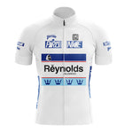 The SCIC Retro Short Sleeve Cycling Set is a white jersey with blue accents, featuring Paris Nice, Reynolds, and Perrier logos. It includes crown motifs on the bottom and chest, a front zipper, and blue side panels.
