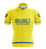 The Louison Bobet Hutchinson BP Retro Cycling Jersey features a yellow design with blue BOBET HUTCHINSON text and blue sleeve and hem stripes, evoking Tour de France nostalgia. A BP patch on the sleeves pays homage to Louison Bobets legendary era.