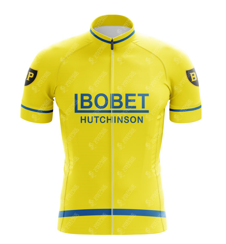The Louison Bobet Hutchinson BP Retro Cycling Jersey features a yellow design with blue BOBET HUTCHINSON text and blue sleeve and hem stripes, evoking Tour de France nostalgia. A BP patch on the sleeves pays homage to Louison Bobets legendary era.