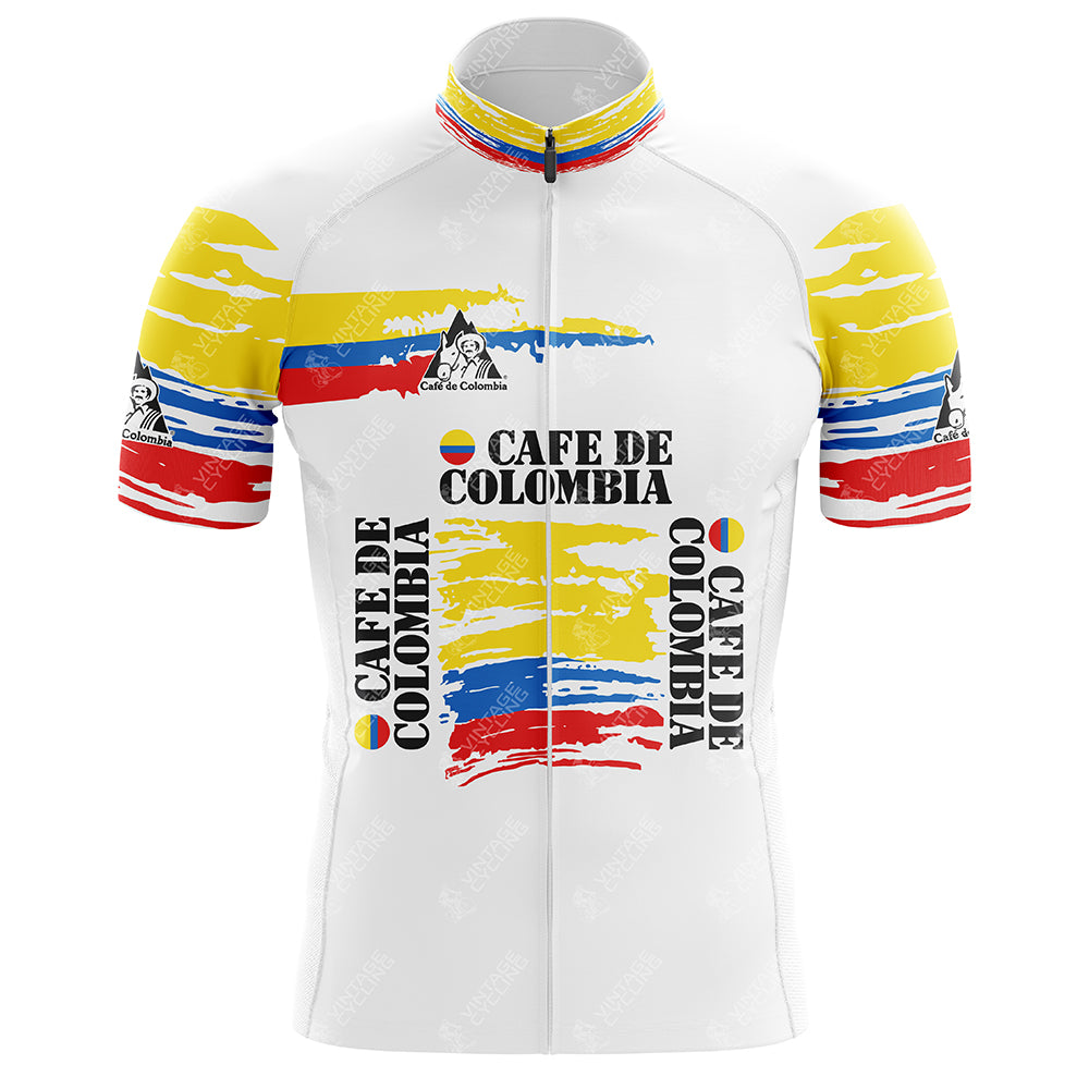 Discover the allure of the Clas-Cajastur Retro Cycling Jersey. This white jersey features striking yellow, blue, and red stripes and is crafted from Lightweight Polyester for comfort. It showcases Cafe de Colombia text with their iconic mountain logo for a classic performance look.