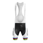 White and black cycling bib shorts with colorful stripes at the bottom mirror the Historisch-Sigma Retro Short Sleeve Cycling Set. They feature del tongo text on the sides and a cyclist logo, embodying classic cycling gear style.