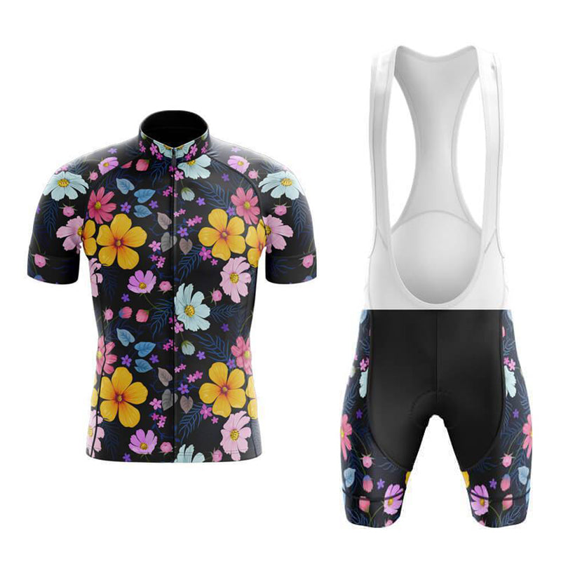The Floral Big Yellow Cycling Jersey Set includes a retro floral jersey with a black short-sleeve design, front zipper, and vibrant yellow, pink, blue, and purple patterns. Matching bib shorts feature white suspenders for a sleek look.