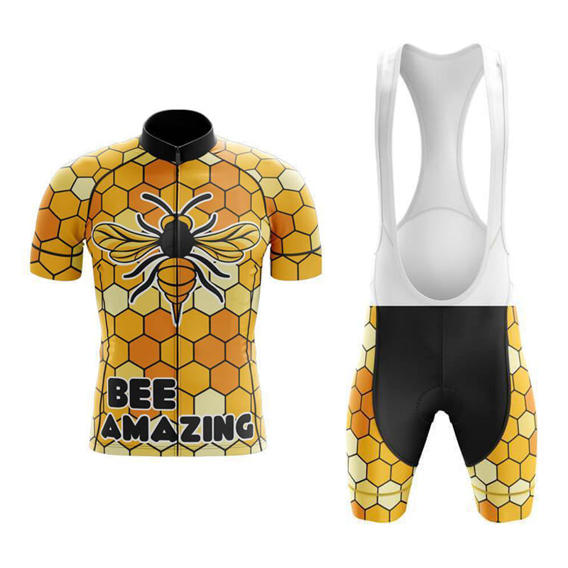The Bee Amazing Cycling Jersey Set features a honeycomb pattern in yellow and orange with a large bee graphic and BEE AMAZING. The matching shorts have white straps and black padding for comfort.