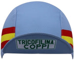 The Tricofilina Coppi Retro Cycling Cap features a light blue, textured fabric with red and yellow side stripes and a TRICOFILINA COPPI patch on the front, embodying the classic Tour de France spirit.