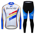 The Banesto Retro Cycling Jersey Long Set (With Fleece Option) features a classic white jersey with blue, red, and yellow stripes. The breathable fabric ensures comfort, while black pants with blue accents and Banesto text add style to every ride.