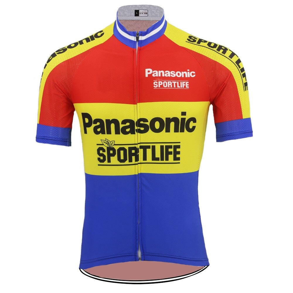 The Panasonic Sportlife Retro Cycling Jersey features red, yellow, and blue panels with black Panasonic and SPORTLIFE text. It has bold SPORTLIFE on yellow shoulders, a full-length front zipper, and a white collar accent, all made from lightweight polyester.