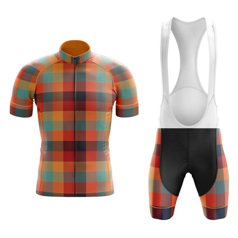 The Tartan Orange Green Cycling Jersey Set showcases a retro design with a colorful short-sleeve jersey and black bib shorts. The bold tartan plaid of orange, teal, red, and beige is featured throughout, with matching panels and white suspenders made from lightweight polyester for comfort.