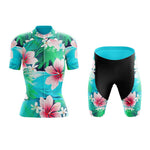 Experience vibrant rides in our Womens Floral Oriental Lily Cycling Jersey Set featuring a lightweight polyester jersey with tropical floral designs in blue, pink, and white on green. Paired with Gel Seat Pad Shorts, this set ensures comfort and style for every adventure.