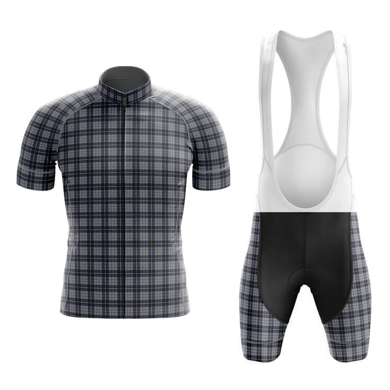 The Tartan Grey Cycling Jersey Set includes a short-sleeved retro tartan jersey in black, blue, and white shades and matching bib shorts with gel padding. The shorts are mainly black with white straps designed for comfort on long rides.