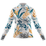 The Womens Long Sleeve Floral White Blue Jersey features a white base with blue and orange leaf patterns of varying sizes and styles for a vibrant botanical look. This cycling jacket zips up to the collar for a snug fit, and comes with an optional fleece lining.