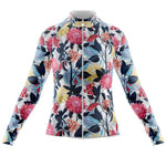 This Womens Long Sleeve Floral Red and Blue Jersey features a cycling jersey style with vibrant pink, red, and yellow flowers complemented by dark blue leaves on a crisp white background. Fleece option available.