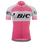 The BIC Pink Short Sleeve Retro Cycling Jersey echoes Jacques Anquetils legendary style, featuring the iconic Bic logo on pink and white polyester with a full front zipper and classic short sleeves.