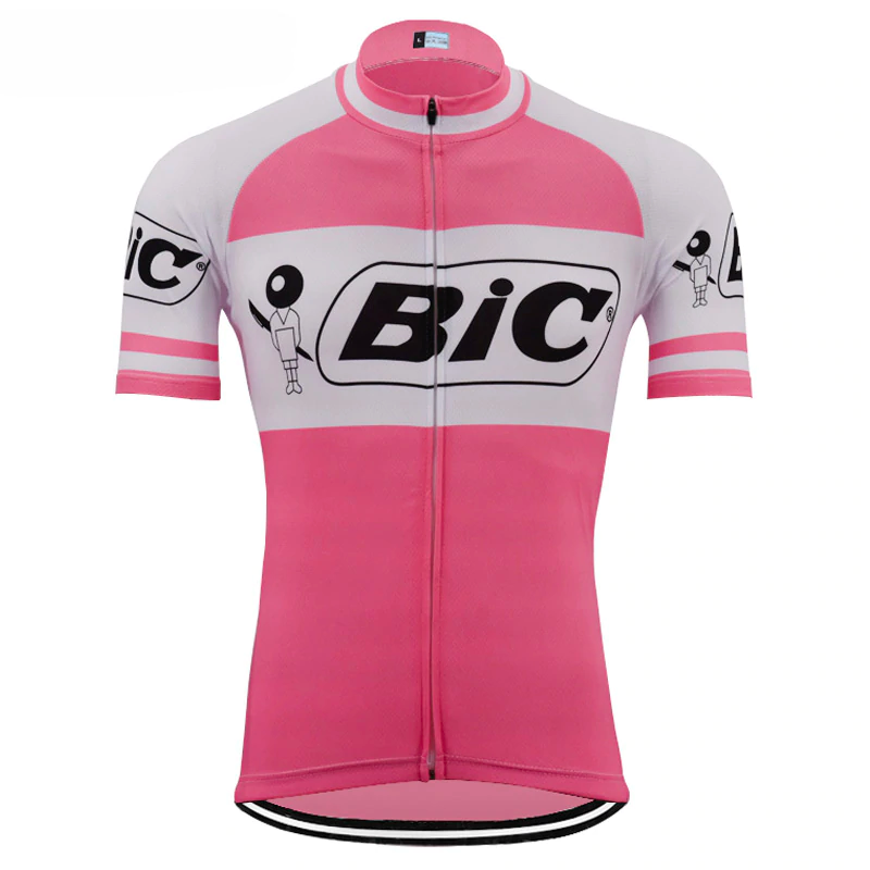 The BIC Pink Short Sleeve Retro Cycling Jersey echoes Jacques Anquetils legendary style, featuring the iconic Bic logo on pink and white polyester with a full front zipper and classic short sleeves.