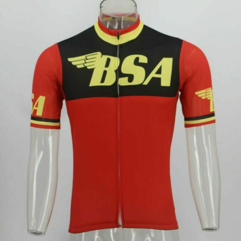 The BSA Retro Cycling Jersey is red with a black upper section, highlighted by large yellow BSA text and winged logos. Made from lightweight polyester, it ensures performance cycling, featuring yellow and black sleeve and neck detailing. Displayed on a clear mannequin.