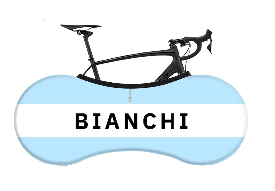 A blue and white BIANCHI banner overlays a sleek black bicycle frame, highlighting the handlebars and saddle. Retro Bianchi Bike Socks complement the scene with a nostalgic touch.