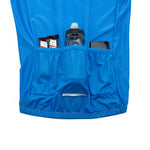 The Bike Logo Blue Cycling Jersey Set is ideal for cycling enthusiasts, featuring three rear pockets to hold two energy bars, a black and gray water bottle, and a black smartphone. Its part of our performance gear line for breathable comfort.