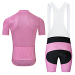 Front and back view of the Bike Logo Pink Cycling Jersey Set: a breathable short-sleeve jersey and bib shorts, featuring a mesh design with rear pockets, white strap section, and black padded area.