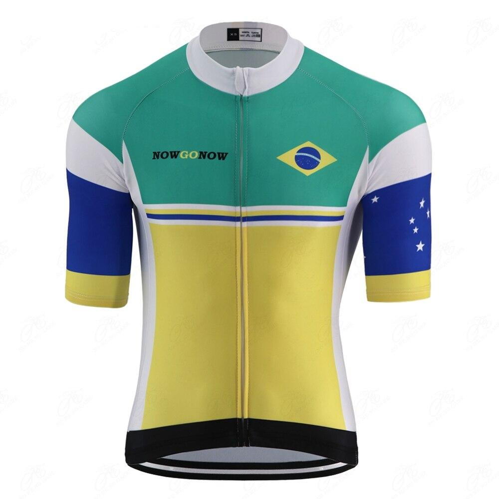 The Brazilian Pro Team Cycling Jersey features vibrant green, yellow, blue, and white colors inspired by Brazils flag. It includes a NOWGONOW logo and a small Brazilian flag emblem on the front with a front zipper closure.