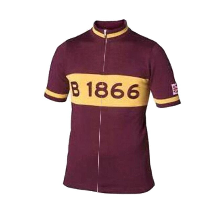 The Brooks 1866 Retro Cycling Jersey is made of lightweight polyester, featuring a maroon color with a yellow horizontal stripe on the chest displaying B 1866 in maroon, referencing Brooks 1866, and a small British flag on the left sleeve.