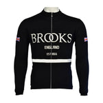 The Brooks England Long Sleeve Retro Cycling Jersey, available with a fleece option, features BROOKS ENGLAND in white on the front, classic white horizontal stripes, and Union Jack flags on the sleeves for timeless appeal.