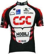 The CSC Nobili 2006 Retro Cycling Jersey, made from lightweight polyester for breathability, showcases a prominent CSC logo in red with sponsors like Nobili, Škoda, and Cervélo. It features a distinctive graphic design in black, red, and white.