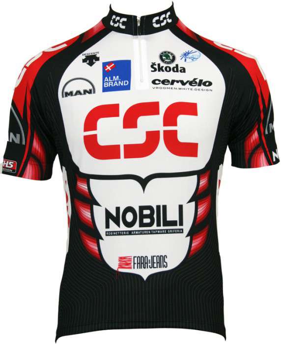 The CSC Nobili 2006 Retro Cycling Jersey, made from lightweight polyester for breathability, showcases a prominent CSC logo in red with sponsors like Nobili, Škoda, and Cervélo. It features a distinctive graphic design in black, red, and white.