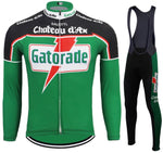 The Chateau dAx Gatorade Retro Cycling Jersey Long Set features a green long-sleeve jersey with zip closure and bold logos, paired with black bib tights displaying the same logos on the side. A cozy fleece option is available for cooler rides.