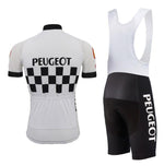 Embrace the charm of the Classic 1960s Peugeot Shell Retro Cycling Jersey Set, echoing Eddy Merckxs era with its white short-sleeved top showcasing Peugeot and a checkered pattern, complemented by black and white bib shorts featuring Peugeot on the leg.