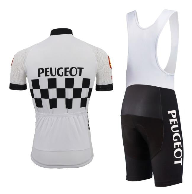 Embrace the charm of the Classic 1960s Peugeot Shell Retro Cycling Jersey Set, echoing Eddy Merckxs era with its white short-sleeved top showcasing Peugeot and a checkered pattern, complemented by black and white bib shorts featuring Peugeot on the leg.