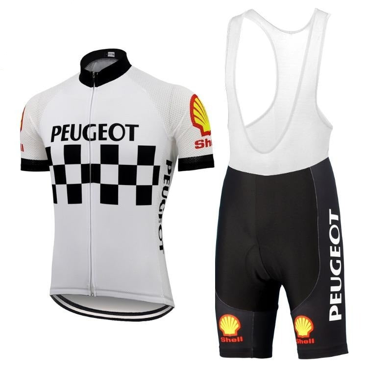 The Classic 1960s Peugeot Shell Retro Cycling Jersey Set includes a white short-sleeve jersey with black checkered pattern, Peugeot branding, and Shell logo. Its paired with black bib shorts featuring matching logos for a true vintage look.