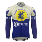 The Corona Beer Retro Cycling Jersey, offering a fleece option, features long sleeves and a vibrant design with a yellow sun, palm trees, Find Your Beach, and the bold Corona logo, making it ideal for style and comfort while cycling.