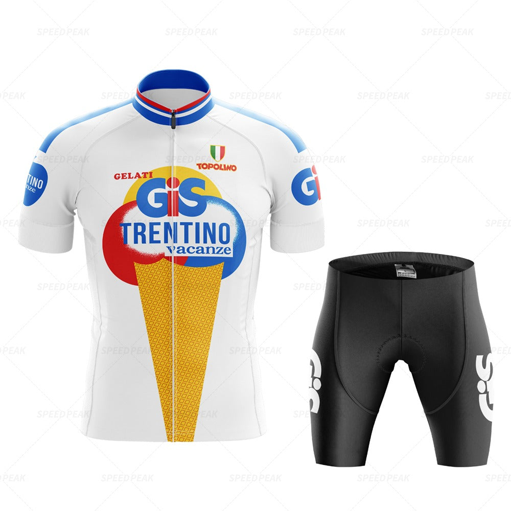 The GiS Trentino Vacanze Retro Cycling Jersey Set combines style and function with a white, blue, and red jersey featuring logos and an ice cream cone design. Made from lightweight polyester for breathability, the set includes black shorts with a side logo.