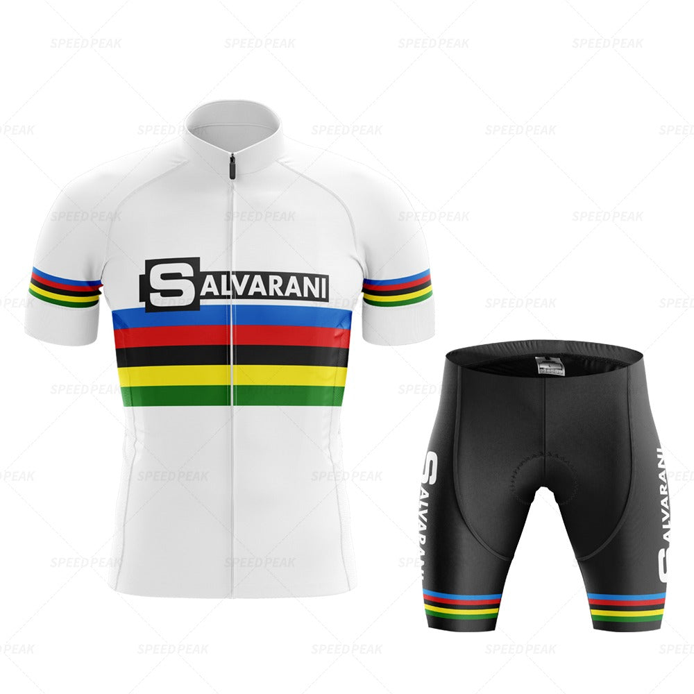 The Salvarani 1972 Retro Cycling Jersey Set includes a white jersey featuring Salvarani text and colorful stripes across the chest, with matching black shorts displaying Salvarani on the left side and rainbow-like stripes near the hem, honoring Felice Gimondi.