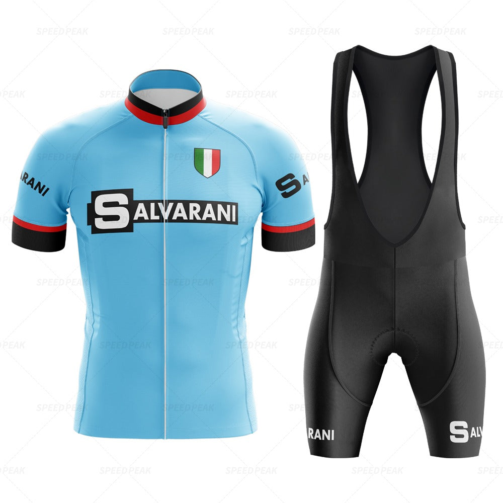 The Salvarani 1972 Retro Cycling Jersey Set, featuring a blue jersey with SALVARANI and the Italian flag on the chest, is ideal for Grand Tours. Inspired by Felice Gimondi, it includes red, white, black accents and black bib shorts with SALVARANI on the side.