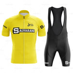 The Salvarani 1972 Retro Cycling Jersey Set features a yellow and black jersey with the SALVARANI logo, inspired by Felice Gimondi. It includes a short-sleeved bright yellow jersey with bold black text and aerodynamic black bib shorts sporting the iconic 1972 Salvarani logo.