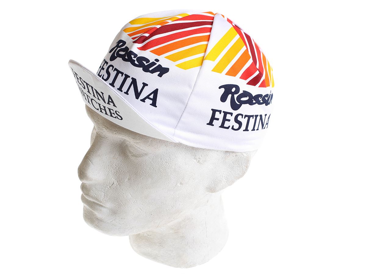 The Festina Watches Retro Cycling Cap elegantly adorns a white mannequin head, featuring a classic design with white fabric complemented by colorful striped patterns and bold black text displaying Rossin and Festina Watches.