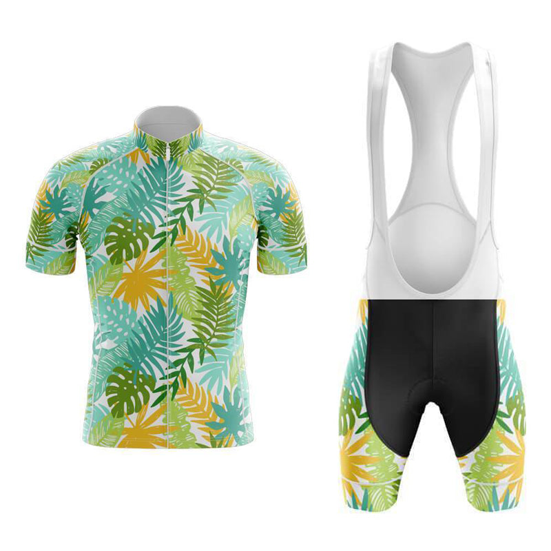 The Floral Bright Palms Cycling Jersey Set showcases a vibrant floral theme with green, yellow, and blue tropical leaf patterns. The bib shorts offer comfort through a breathable gel pad and feature a white top, black seat area, and silicone waist strip for a secure fit.