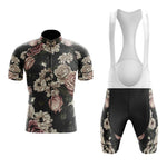 The Floral Vintage Cycling Jersey Set includes a short-sleeved jersey with a dark floral rose pattern and bib shorts featuring white straps and matching floral accents.