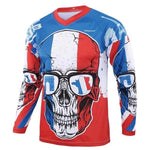 The France Long Sleeve Skull Cycling Jersey features a red, white, and blue skull design with sunglasses reflecting the French flag. Its patriotic abstract patterns make it ideal for avid cyclists.