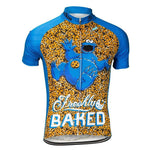 The Freshly Baked Cookie Monster Retro Cycling Jersey showcases a retro blue and orange design with a playful cartoon character amidst cookies and Freshly Baked text on the chest, echoing Cookie Monsters delightful chaos.