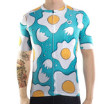 A person displays the Fried Eggs Cycling Jersey, crafted from lightweight polyester for top aerodynamic performance, against a white backdrop. Their right arm features a detailed skull and flower tattoo.
