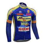 The Mercatone Uno Wega Retro Cycling Jersey features long blue sleeves with yellow and red accents, sponsor logos like Mercatone Uno Wega, Girmi, and Wegaw, geometric patterns, and a front zip closure. A cozy fleece version is also available for cooler rides.