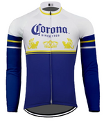 Feel nostalgic with the Corona Beer Retro Cycling Jersey, featuring long sleeves and a classic white top with a blue bottom. Adorned with the Corona logo since 1925, it boasts yellow crowns, griffins, a front zipper, and horizontal stripes for a stylish flair.