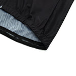 A close-up view of the Bike Now Beer Later Cycling Jersey Set showcases a black jersey edge with elastic material, a light blue grid-patterned inner lining, and a smooth, lightweight fabric texture.
