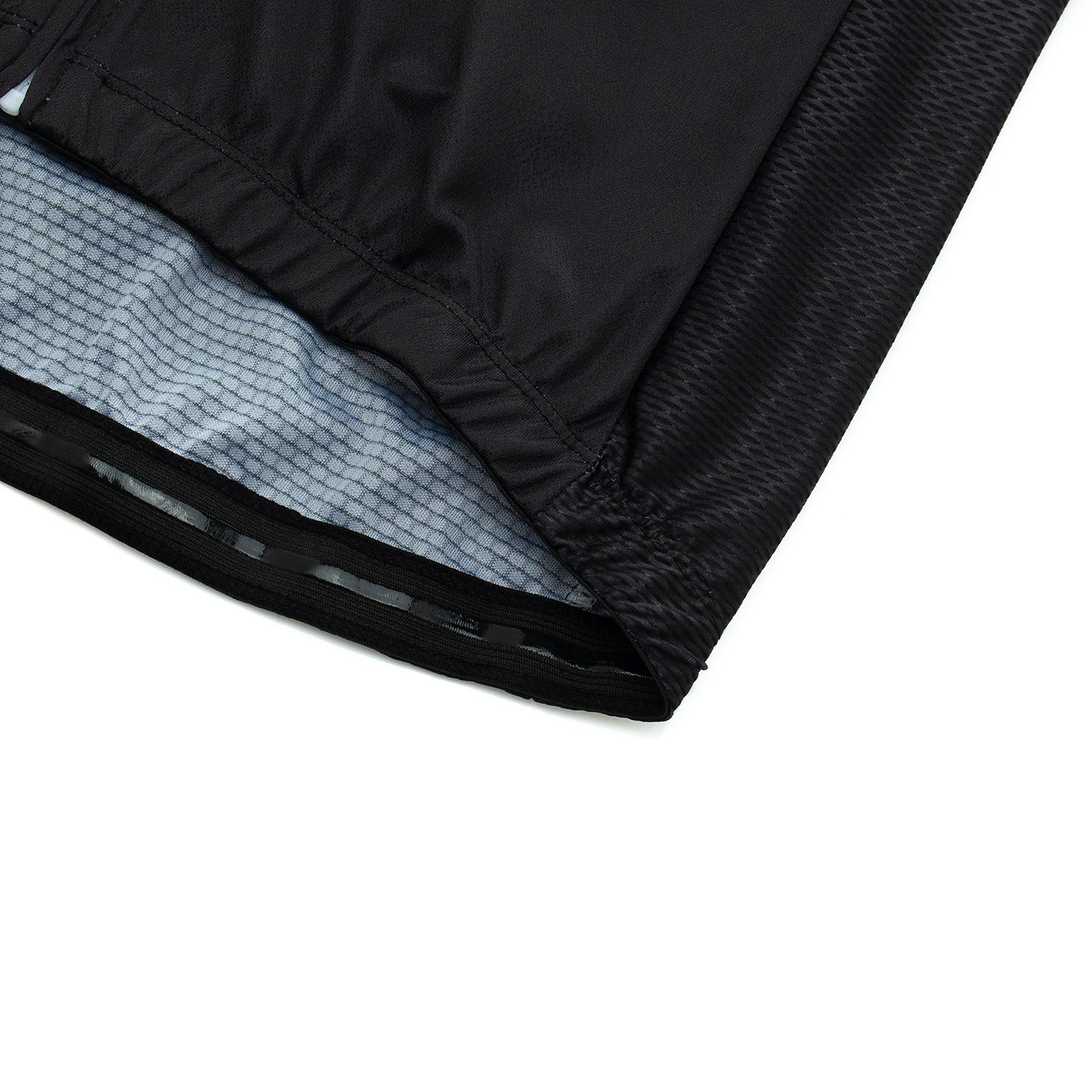 A close-up view of the Bike Now Beer Later Cycling Jersey Set showcases a black jersey edge with elastic material, a light blue grid-patterned inner lining, and a smooth, lightweight fabric texture.