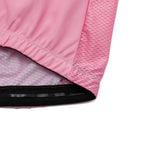 Close-up of the Bike Logo Pink Cycling Jersey Set revealing its textured, breathable fabric and stitching. The focus is on the sleeve and torso area, emphasizing the pattern and airy design.
